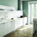 Compact modern kitchenette with wooden counters